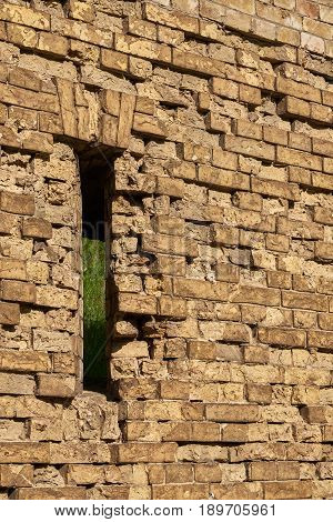 Gun loophole in the brick wall of the fortification of the nineteenth century The Kiev Fortress