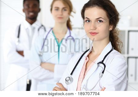 Medical team of confident doctors ready to help. Medicine and health care, insurance concept.