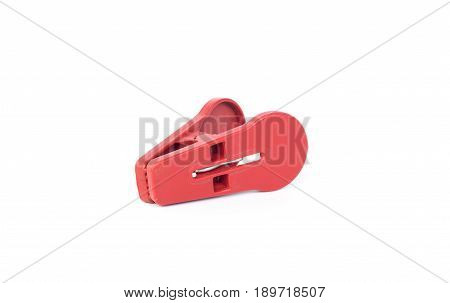 red clothspin or clothes pegs isolated on white