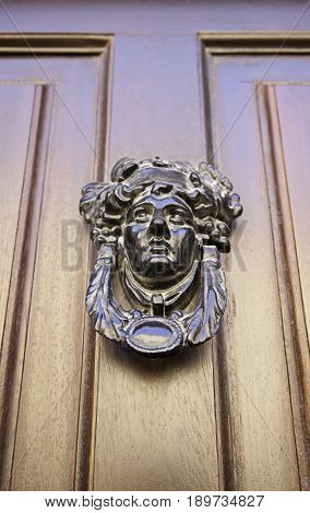 Former Victorian Door Detail Of An Old Door Knocker In Classic Detail