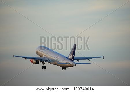 Amsterdam the Netherlands - June 1st 2017: OY-KAU SAS Scandinavian Airlines Airbus A320 taking off from Polderbaan Runway Amsterdam Airport Schiphol