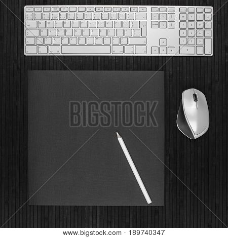 workspace desk with keyboard and pencil copy space background black
