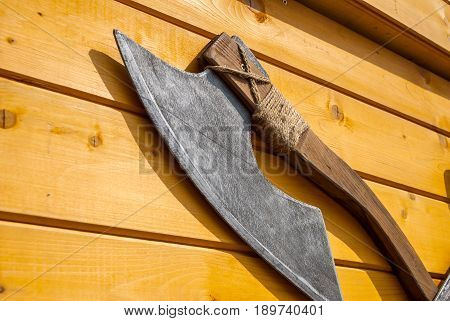 medieval weapons on wooden desk. close up