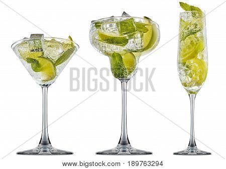 fresh fruit alcohol cocktail or mocktail in classic margaritta, martini, champagne glass with ice cubes, lime and mint isolated on white background