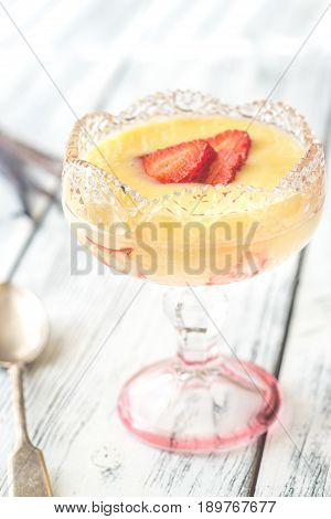 Sabayon With Strawberry Slices On The Wooden Background