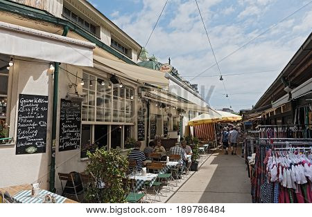 VIENNA, AUSTRIA-JUNE 01, 2017: People enjoy the Naschmarkt in Vienna, Austria