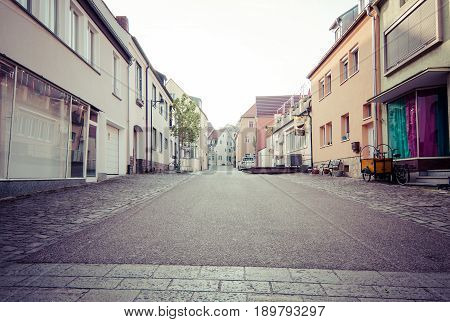 SCHWEINFURT GERMANY - APRIL 21 2017: Old streets in the historic part of the city. Vintage toning. Schweinfurt - a medieval city founded in 761 year.