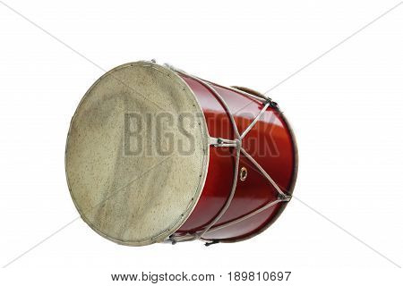 Georgian traditional musical instrument, drum red colored named doli lying on its side close-up isolated on white