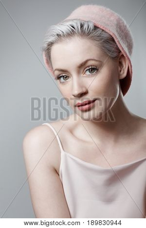 Closeup portrait of attractive young woman in retro style.