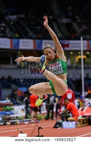 BELGRADE SERBIA - MARCH 3-5 2017: WOMAN LONG JUMP PENTATHLON KRIZSAN XENIA EUROPEAN ATHLETICS INDOOR CHAMPIONSHIPS IN BELGRADE SERBIA