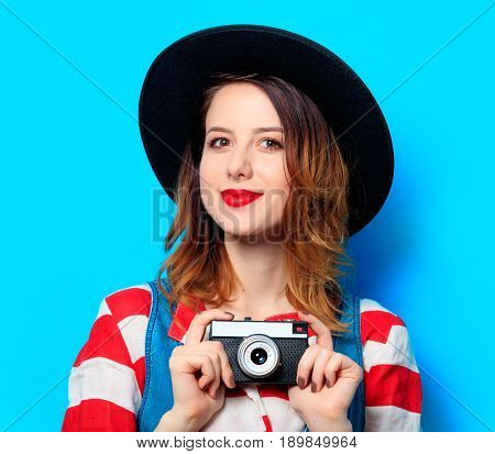 Woman Wit Camera On Blue Background
