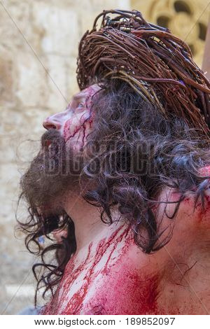 JERUSALEM - APRIL 14 : Christian pilgrim re-enact the crucifixtion of Jesus along the Via Dolorosa in Jerusalem during Good friday on April 14 2017
