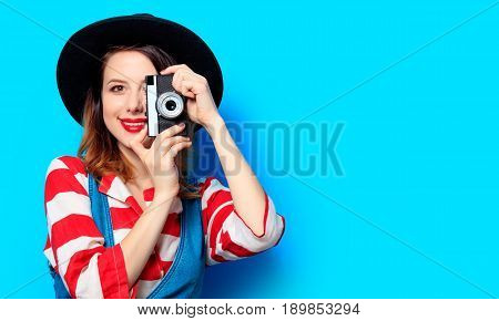 Woman Wit Camera On Blue Background
