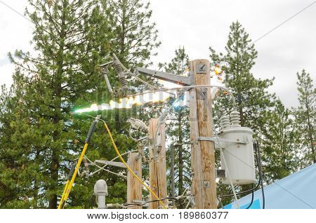 Mead, WA - June 3, 2017: Fire station 92 Wellness day demonstrations, Avista engineers showing dangers of high voltage electricity arcing