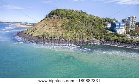 Aerial view of Burleigh Headland National Park and Tallebudgerra beach coastlines. Gold Coast, Australia