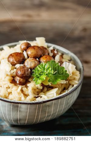 Mushroom Risotto With Parmesan Cheese. Italian Food. Simple Back