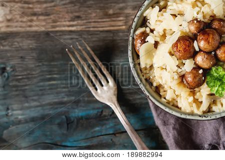 Mushroom Risotto With Parmesan Cheese. Italian Food. Simple Back
