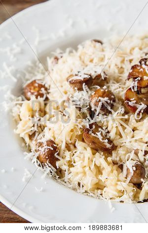 Mushroom Risotto With Parmesan Cheese. Italian Food. Simple Back