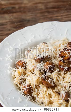 Mushroom Risotto With Parmesan Cheese. Italian Food. Simple Back
