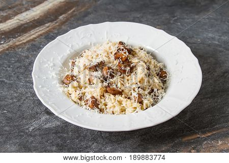Mushroom Risotto With Parmesan Cheese. Italian Food. Simple Back
