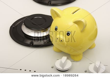 Sparschwein mit einem Gasherd (sparen Erdgas)