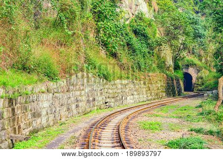Tunnel and steam narrow-gauge railway from Yuejin to Bagou in the jungle. Jiayang Mining Region. Sichuan province. China