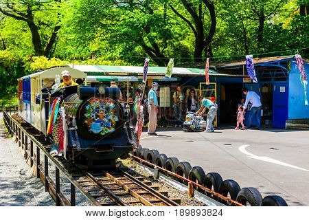 Kid Amuse Train Behind Odawara Castle.