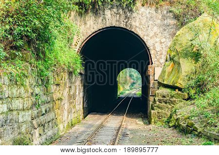 Tunnel and steam narrow-gauge railway from Yuejin to Bagou in the jungle. Jiayang Mining Region. Sichuan province. China