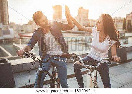 Romantic Couple With Bicycles In The City