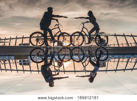 Romantic Couple With Bicycles In The City