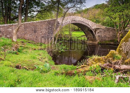 Ivelet Bridge - The picturesque hump-backed bridge at Ivelet crosses the River Swale approximately a mile and half west of Gunnerside in Swaledale