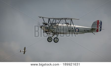Biggleswade UK - 7th May 2017: Vintage 1928 Hawker Tomtit biplane in flight