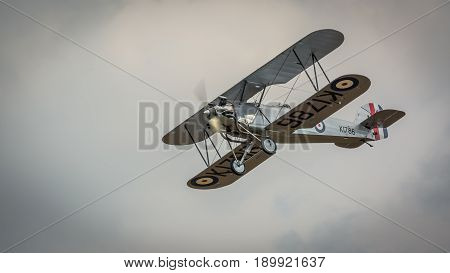 Biggleswade UK - 7th May 2017: Vintage 1928 Hawker Tomtit biplane in flight