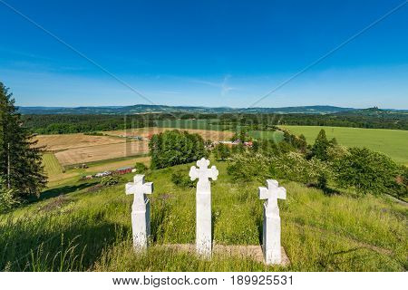 Three white crosses on Vysker hill in Bohemian Paradise