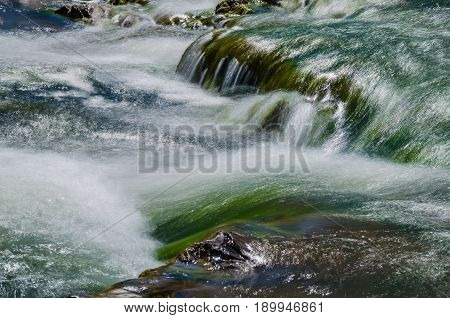 Background Of Carpathian Mountain River With Long Exposure
