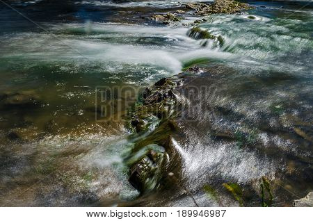 Background Of Carpathian Mountain River With Long Exposure