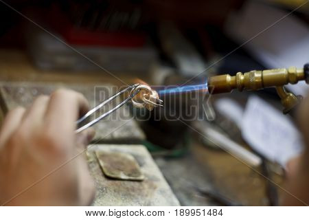 A Ewelry Making Close-up Details Of The Production