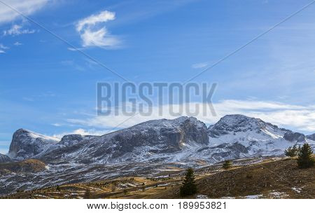 Winter landscape in Alps in Devoluy Massif (Mountain Aurouze and Peak Bure) with little snow in late December - a very worrying sign of climate change.