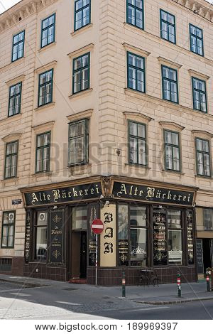 VIENNA, AUSTRIA-JUNE 01, 2017: Residential house with bar old bakery in vienna