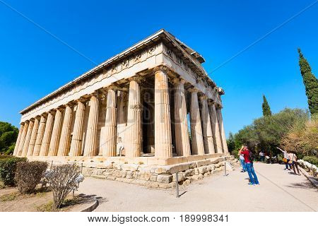 Athens, Greece - October 14, 2016: Tourists near temple of Hephaestus in Athens, Greece