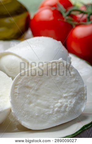 Balls And Pieces Of Buffalo Mozzarella, Soft Italian Scheese Made From The Milk Of Italian Mediterra
