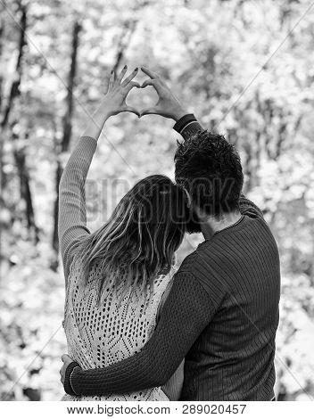 Couple In Love Show Heart Sign With Fingers