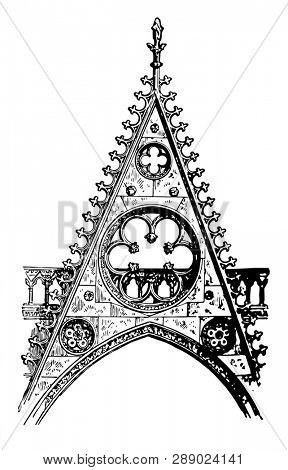 Gable at Notre Dame de Paris, the South Transept Door,  Gable, Gothic architecture, vintage line drawing or engraving illustration.