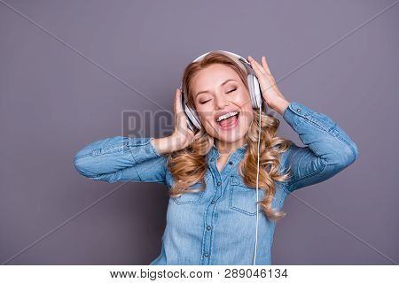 Close-up Portrait Of Nice Cute Lovely Charming Attractive Cheerful Wavy-haired Lady Wearing Blue Shi