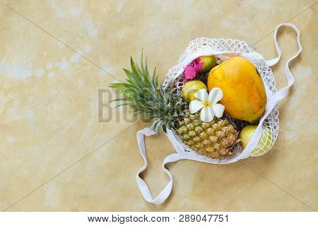 Pineapple Papaya In Eco String Bag Top Down View