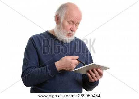 Funny bald and bearded old man using tablet computer, isolated on white