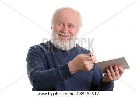 Positive bald and bearded old man invite you to use his tablet computer, isolated on white