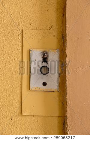 Old Elevator Call Button With Grungy Pattern In A Soviet Building In Post-soviet Riga, Latvia