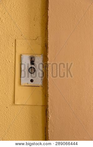 Old Elevator Call Button With Grungy Pattern In A Soviet Building In Post-soviet Riga, Latvia