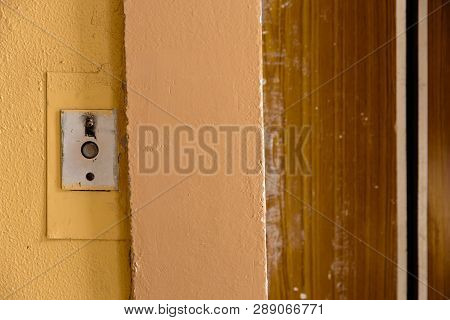 Old Elevator Call Button With Grungy Pattern In A Soviet Building In Post-soviet Riga, Latvia